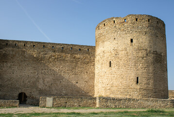 Ancient citadel fortress. Military tower fortifications. Medieval security defensive wall surrounding the old town. Archaeological excavations ruins bastion Ackerman.