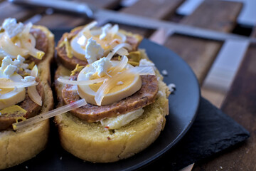 Traditional liverwurst sandwich with cheese and onions