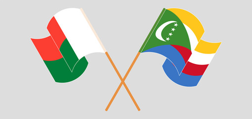 Crossed flags of Madagascar and the Comoros. Official colors. Correct proportion
