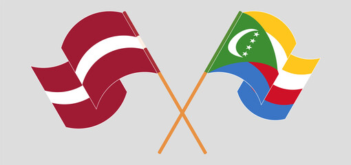 Obraz premium Crossed flags of Latvia and the Comoros. Official colors. Correct proportion