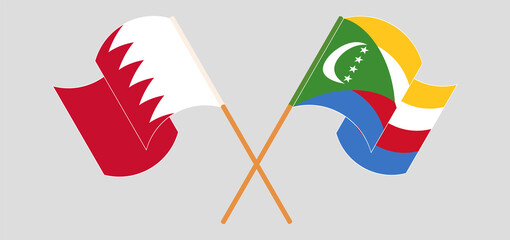 Crossed flags of Bahrain and the Comoros. Official colors. Correct proportion