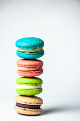 Sweet colorful macarons isolated on white background. Tasty colourful macaroons. High quality photo