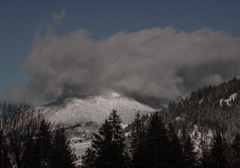 Winter, high mountains with snow white peaks.  Location place Carpathian, Vatra Dornei, Bucovina, Suceava, Romania, Europe.