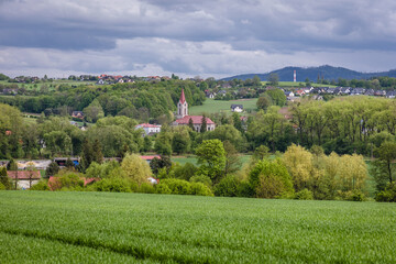 Fototapeta na wymiar Landscape with Evangelical-Augsburg Church in Miedzyrzecze Gorne, small village in Silesia region of Poland