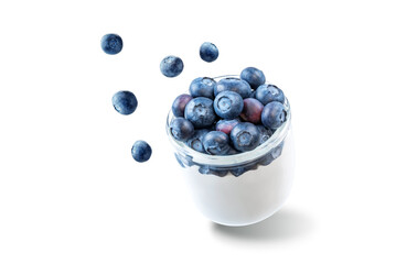 Greek yogurt with blueberries in a glass on a white isolated background