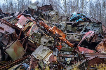 Piles of old rusty soviet crushed trucks in scrap metal yard. Car recycling