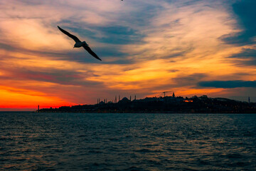 Fototapeta na wymiar Istanbul background. Cityscape of Istanbul at sunset with dramatic clouds