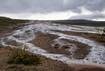 Strokkur Geysir geyser in southwestern Iceland, Europe, Haukadalur geothermal area in the time between eruptions.
