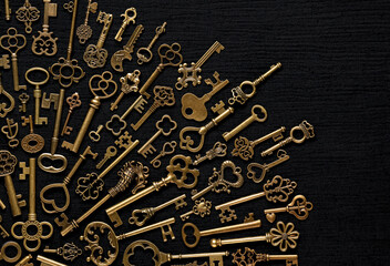 Vintage victorian style golden skeleton keys. Concepts of keys to success, unlocking potential, or achieving goals.