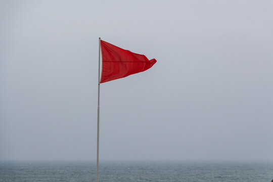 Red flag in Ris beach in Douarnenez