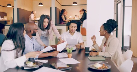 Its amazing what you can achieve if you do not care who gets the credit. Group of young business people at a conference table in a modern office, talking and having lunch during a meeting - Powered by Adobe