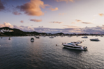 Bay with boats at sunset.