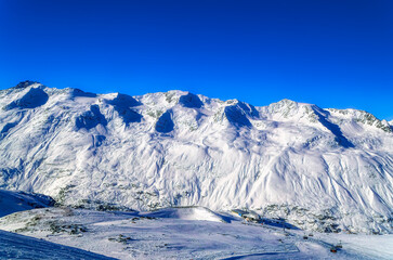 Austrian Alps covered with fresh snow during sunny winter day in Obergurgl, Austria.