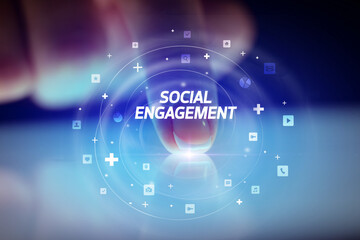 Finger touching tablet with social media icons concept