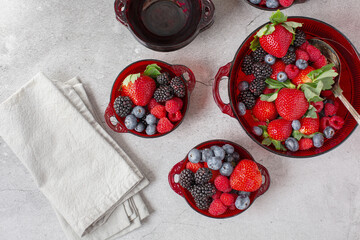 Red Bowl of Mixed Berries; Strawberries, Blackberries, Blueberries, and Raspberries