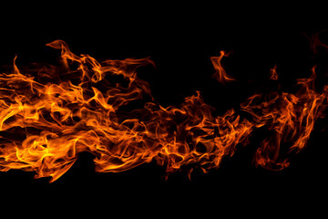 Fototapeta na wymiar Horizontal orange red Fire flame against black background, abstract texture, copyspace