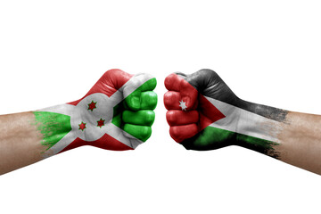 Two hands punch to each others on white background. Country flags painted fists, conflict crisis concept between burundi and jordan