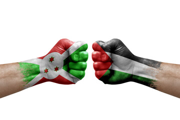 Two hands punch to each others on white background. Country flags painted fists, conflict crisis concept between burundi and palestine