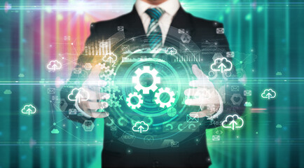 Businessman holding technology icon