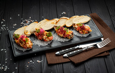 Tuna ceviches, mussels and caviar on mussel shells