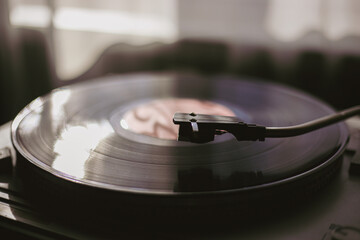 Playing classic vinyl records in daylight close-up