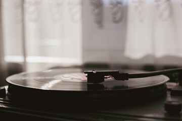 Playing classic vinyl records in daylight close-up