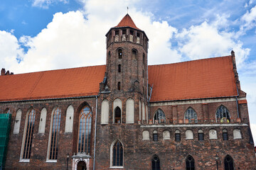 Fototapeta na wymiar brick belfry of gothic church