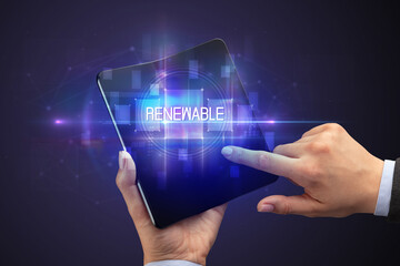 Businessman holding a foldable smartphone