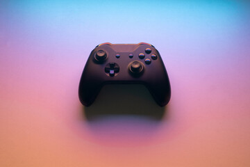 wireless joystick gamepad for pc or console isolated on a colorful background. gaming concept.