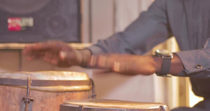 Man playing African tribal drums
