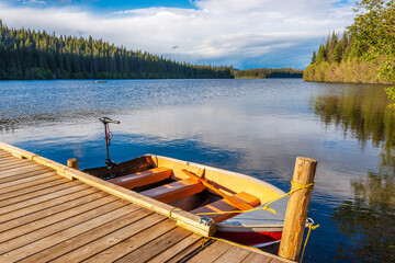 Fototapeta na wymiar Lake with white clouds in Vancouver, Canada, North America.