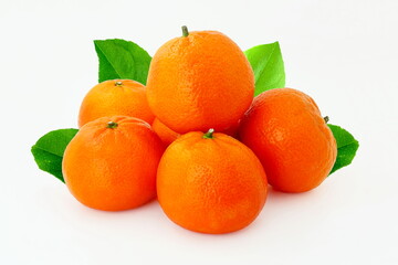 fresh tangerine or mandarin orange fruit with leaves isolated on white background