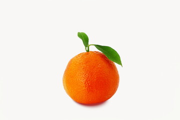 fresh tangerine or mandarin orange fruit with leaves isolated on white background