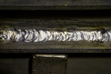 Unsightly fillet weld on a metal profile.