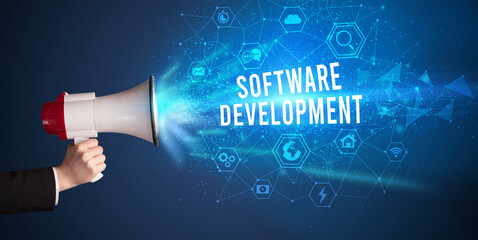 Young woman shouting in megaphone, technology announcement concept