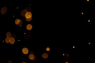 Luxury golden bokeh on black background for decoration © Anastasia