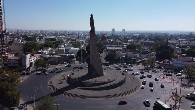 wide flying counter clockwise around Monumento a los Ninos Heroes in Guadalajara