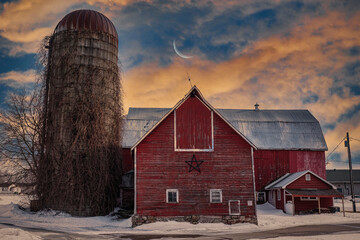 Rural landscapes of farms and barns and wooded area in the southern Ontario region of Canada.  Featuring outbuildings, and forested trails with brilliant skies. © Jason