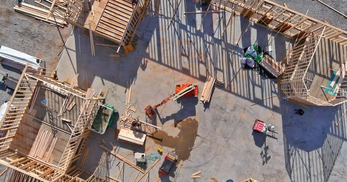 Exterior top view of a new house under construction framing the beams stick