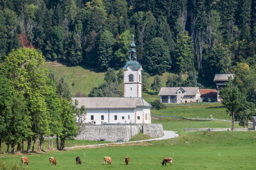 Typical alpine catholic church in Zgornje Jezersko, in Slovenia, at the border with Austria, in the...