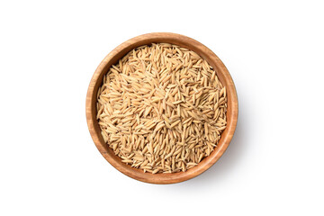 Flat lay (top view) of paddy jasmine rice in wooden bowl isolated on white background. Clipping path.