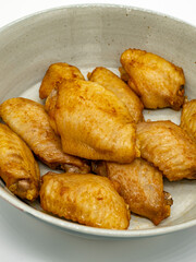 A plate of roast chicken wings