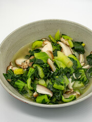Chinese traditional dish, fried mushrooms with green vegetables