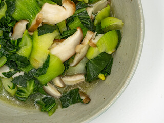 Chinese traditional dish, fried mushrooms with green vegetables