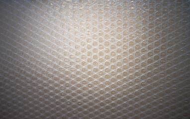 Photo of the texture of the film with air bubbles. Film for packaging fragile items.Shock-absorbing...
