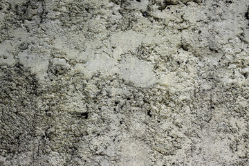 Distressed rough surface of an old concrete wall for texture background