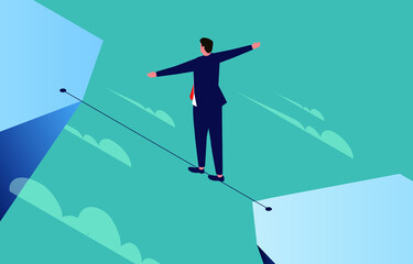Daring businessman walking a tightrope across a cliff.