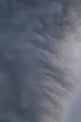 Fototapeta premium Dark clouds gathered in the sky prior to a summer rainstorm