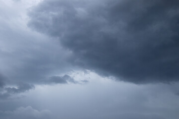 Fototapeta premium Dark clouds gathered in the sky prior to a summer rainstorm