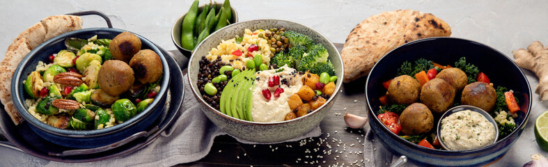 Vegan dishes assortment on light background.
